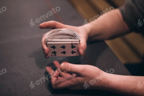 Preview: ↟ People play poker. Cards, chips for the game. Evening lighting. Gambling