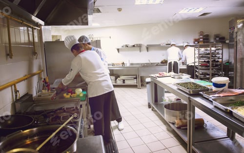 Preview: team cooks and chefs preparing meals