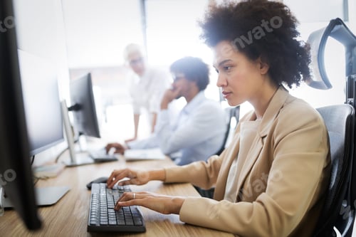 Preview: Successful business group of people at work in office