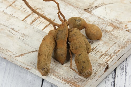 Preview: Tamarind fruits isolated on white background.