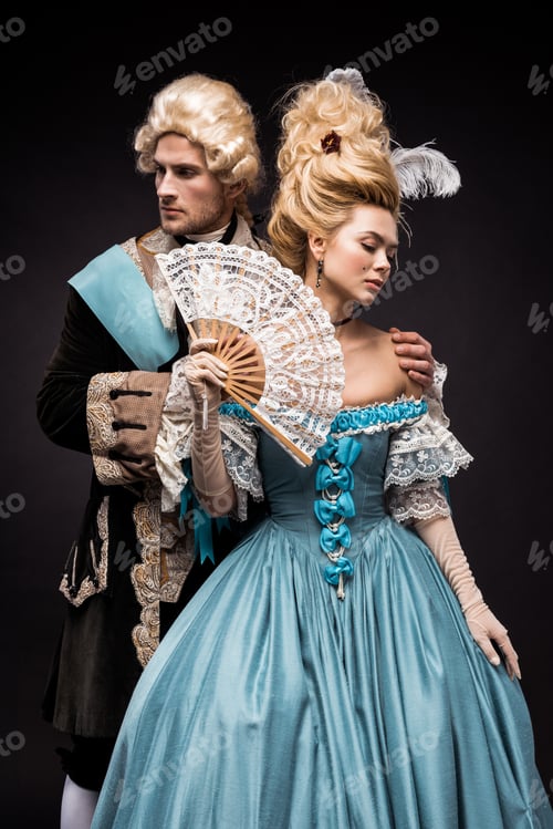 Preview: handsome man near victorian woman in wig holding fan on black