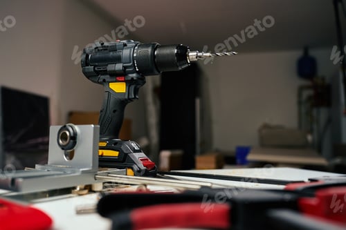 Preview: Cordless drill and tools in home renovation workshop
