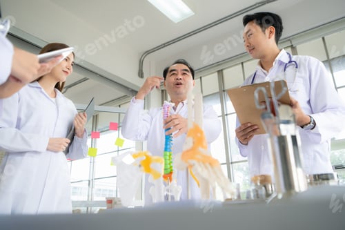 Preview: A medical professor is lecturing on a case study related to disease treatment to medical students