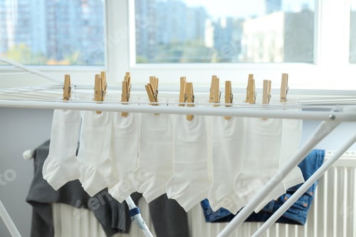 Preview: Washed white socks are dried in the dryer