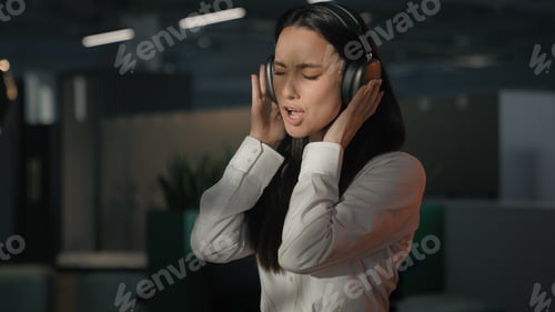 Preview: Happy funny carefree Caucasian business woman girl office worker at evening end of work day
