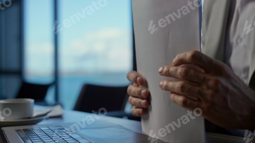 Preview: Businessman hands reading documents at office closeup. Director keeping papers