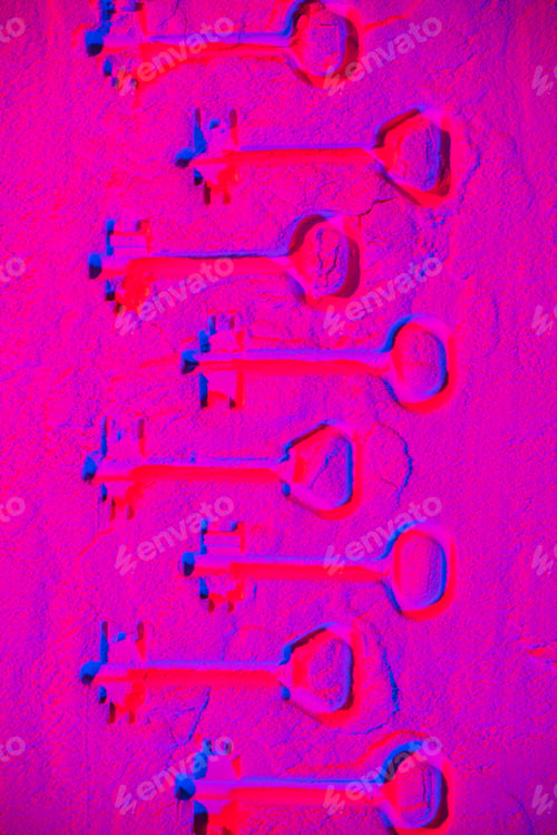 Preview: shapes of keys on pink neon powder background