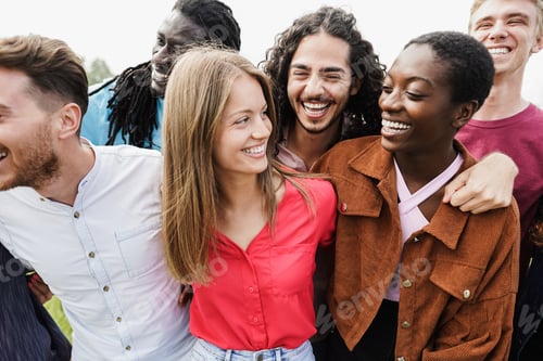 Preview: Multiethnic young friends having fun outdoor - Focus on guy with long hair