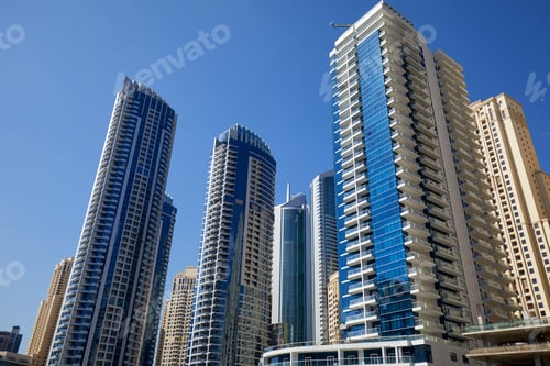 Dubai Marina skyscrapers in a sunny day, clear blue sky in Dubai