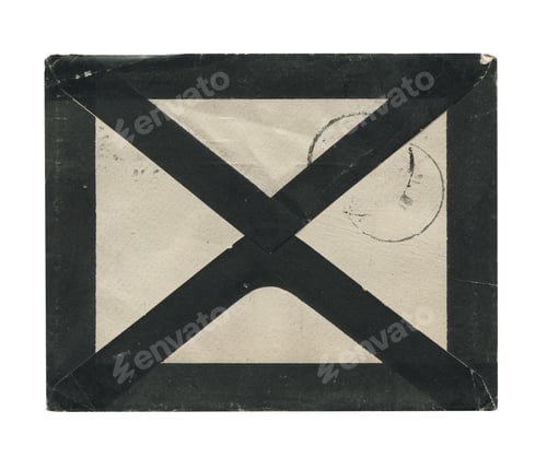 Preview: front view of old closed aged paper envelope with faded stamp print and black border frame isolated