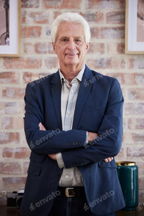 Preview: I know all things business. Shot of a senior businessman standing with his arms crossed at work.