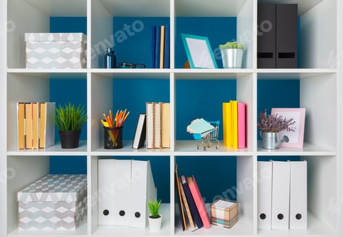 Preview: Stacks of supplies and paperwork in the office and bookshelves