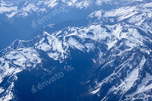Preview: Snowy Mountain Tops From High Up