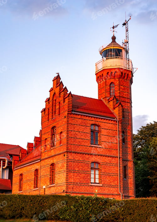 Preview: the historic lighthouse in Ustka at sunset