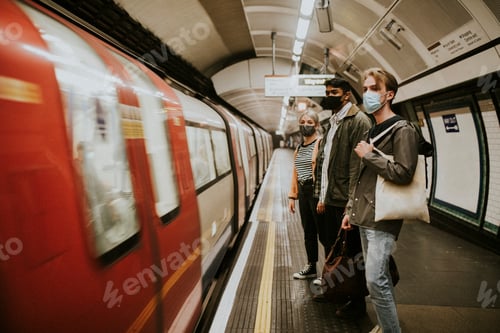 Preview: Passengers waiting for a train on a platform