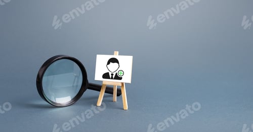 Preview: Magnifying glass and an easel with a new hired employee.