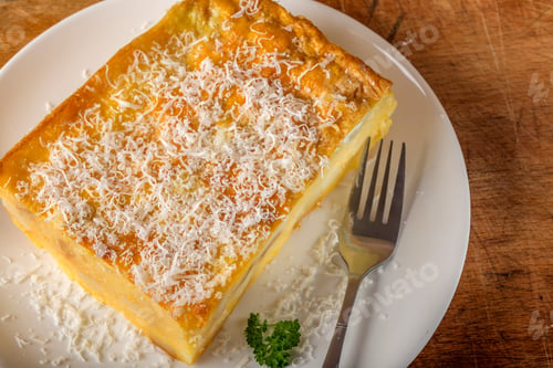 Preview: Baked polenta with potatoes, cheese and smashed eggs