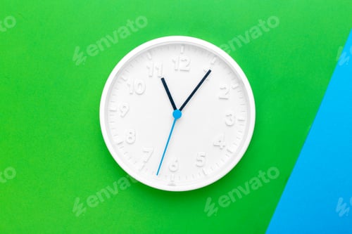 Preview: Wall Clock on color background. Creative Photo