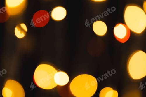 Preview: Multiple yellow bokeh lights with copy space on dark background