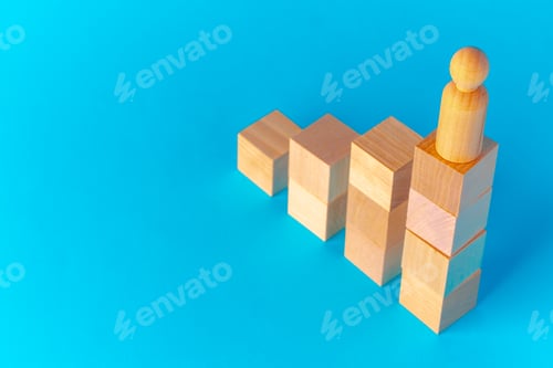 Preview: Toy wooden blocks on blue background front view