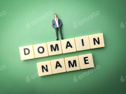 Preview: Miniature people and toys word with the word DOMAIN NAME