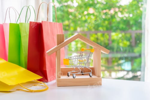 Preview: Colorful paper shopping bags on white table, Online shopping at home concept