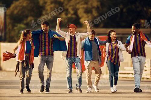 Preview: Enthusiastic Fans Celebrate Together Outdoors in Urban Setting