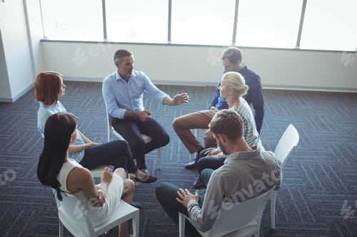 Preview: Creative business people discussing at office