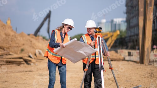 Preview: Construction surveyor or engineer working in pipe construction site inspection