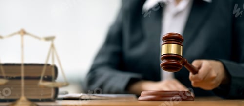 Preview: Female Judge with gavel on table