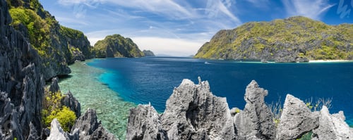 Preview: El Nido, Palawan, Philippines. Panorama of tapiutan strait with tourist boats on tour C. View from