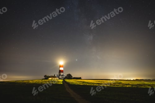Preview: Scenic view of the Happisburgh Lighthouse illuminating at night, Great Britain