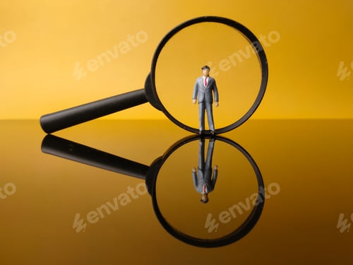 Preview: Miniature people and magnifying glass with reflection