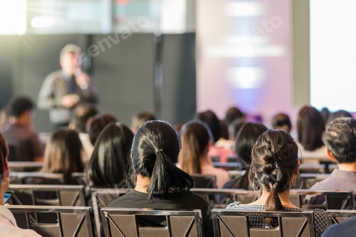 Preview: Rear view of Audience in the conference hall or seminar meeting which have speaker