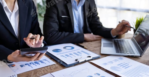 Preview: Business team Negotiation, Analysis, Discussion, Asian woman economist and marketer pointing to a fi
