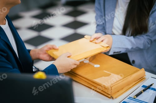 Preview: A female lawyer at a law firm is delivering documents and discussing business matters with male