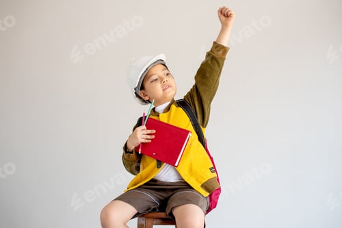 Preview: Portrait of Asian yellow coat and white engineer helmet show action of cheerful