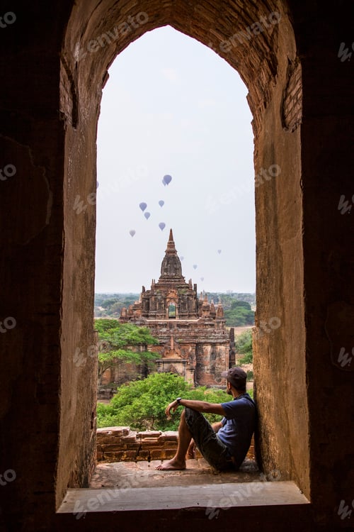 Preview: A young tourist in the sunset of some temples of Bagan. Myanmar