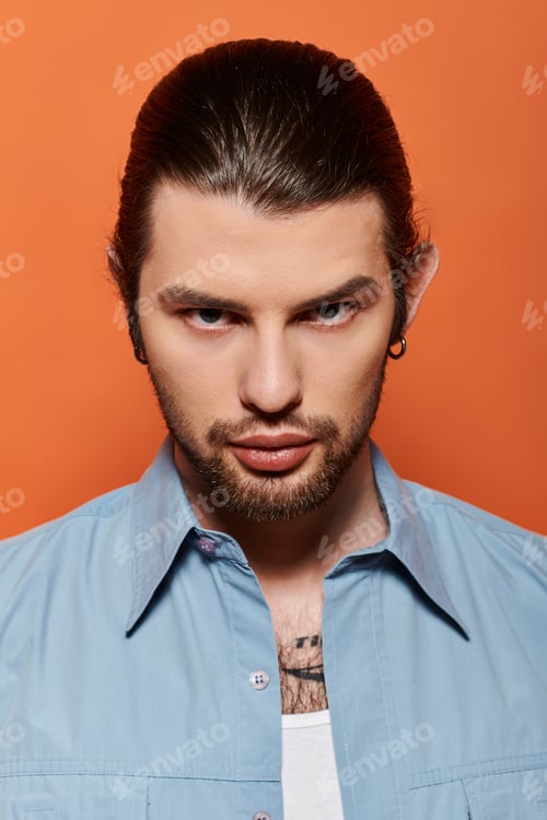 Preview: Elegant Bearded Man in Blue Shirt
