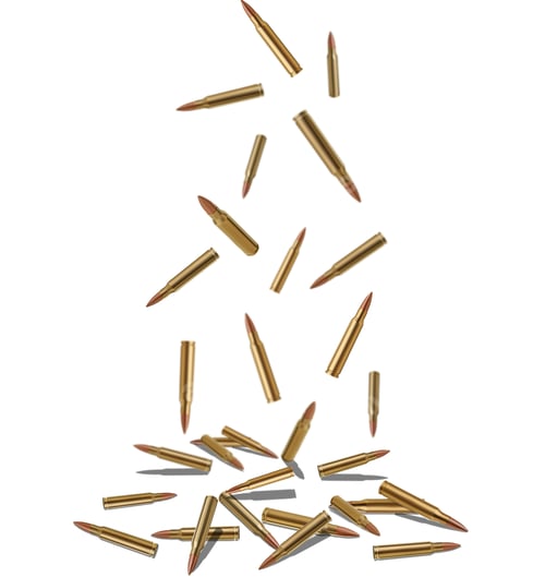 Preview: Many bullets falling on white background. Firearm ammunition