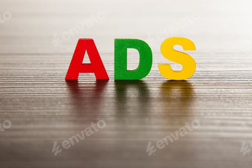 Preview: word ADS on wooden table, business concept.
