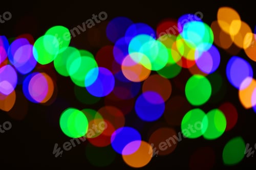 Preview: Beautiful colorful lights on dark background. Bokeh effect
