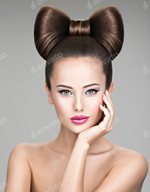 Preview: Beautiful woman with stylish bow hairstyle.