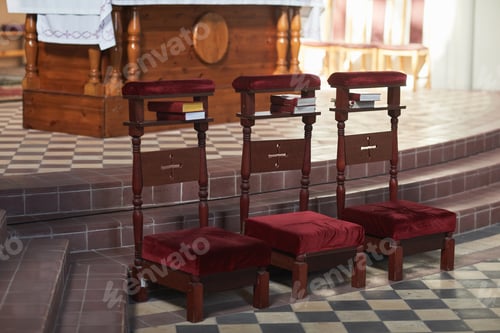 Preview: A few red chairs in church
