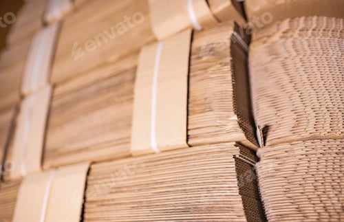Preview: Close-up large cardboard piles lie on top