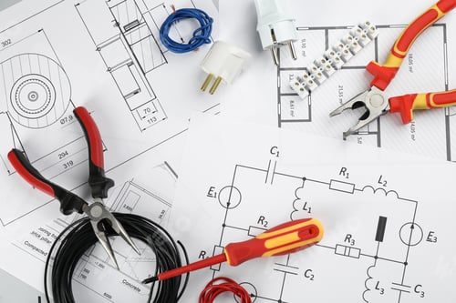 Preview: Flat lay composition with electrician's tools and house plan sheets on table