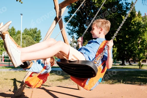 Preview: Kids swinging on swings