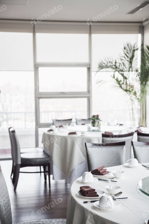 Preview: Dining room with elegant table settings.