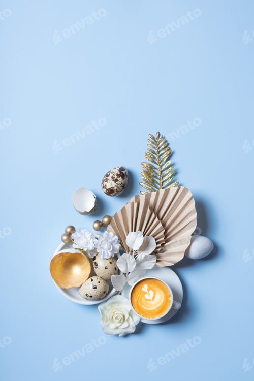 Preview: Modern creative composition with coffee cup, easter eggs, palm leaves and flowers top view