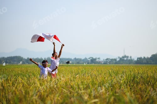 Preview: Happy Indonesian elementary student boy celebrating independence day